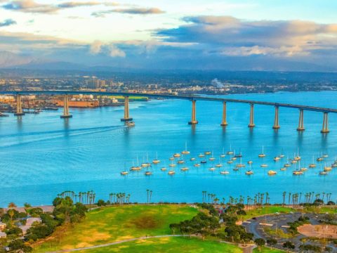 Aerial view of San Diego Bay with boats and Coronado Bridge